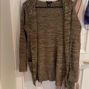 Green and white cardigan